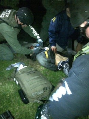 Picture Shows Suspect 2 On Ground And In Handcuffs