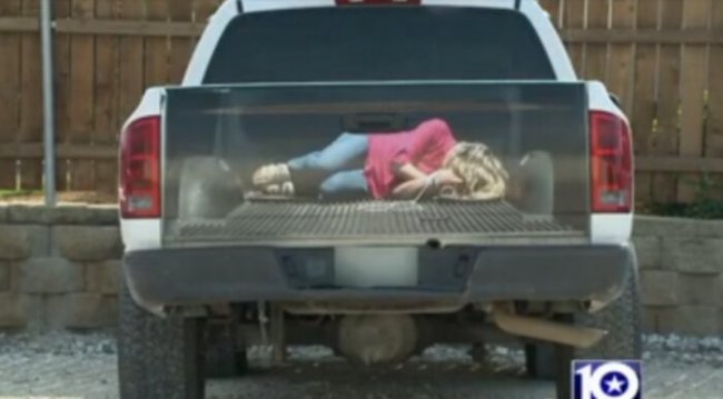 Texas Sign Company Shows Woman Hogtied in Truck