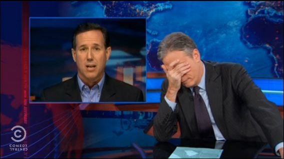 Jon Stewart to Ignorant Santorum – “Obamacare is NOT Apartheid!”