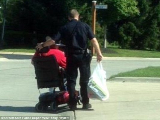 Breaking News – This Police Officer is Actually HELPING Someone