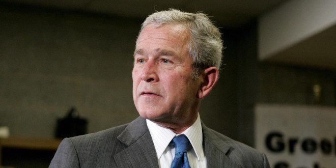 US President George W. Bush leaves after