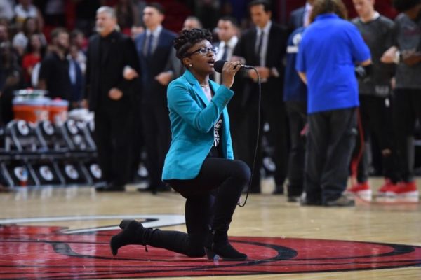 Singer Protests – Performs The National Anthem on One Knee – Video