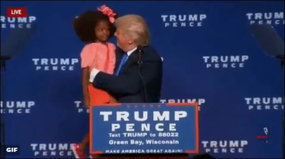 Trump Tries and Fails to Kiss a Little Black Girl on The Lips – Video